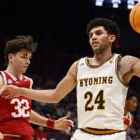 Wyoming Player Holds Basketball